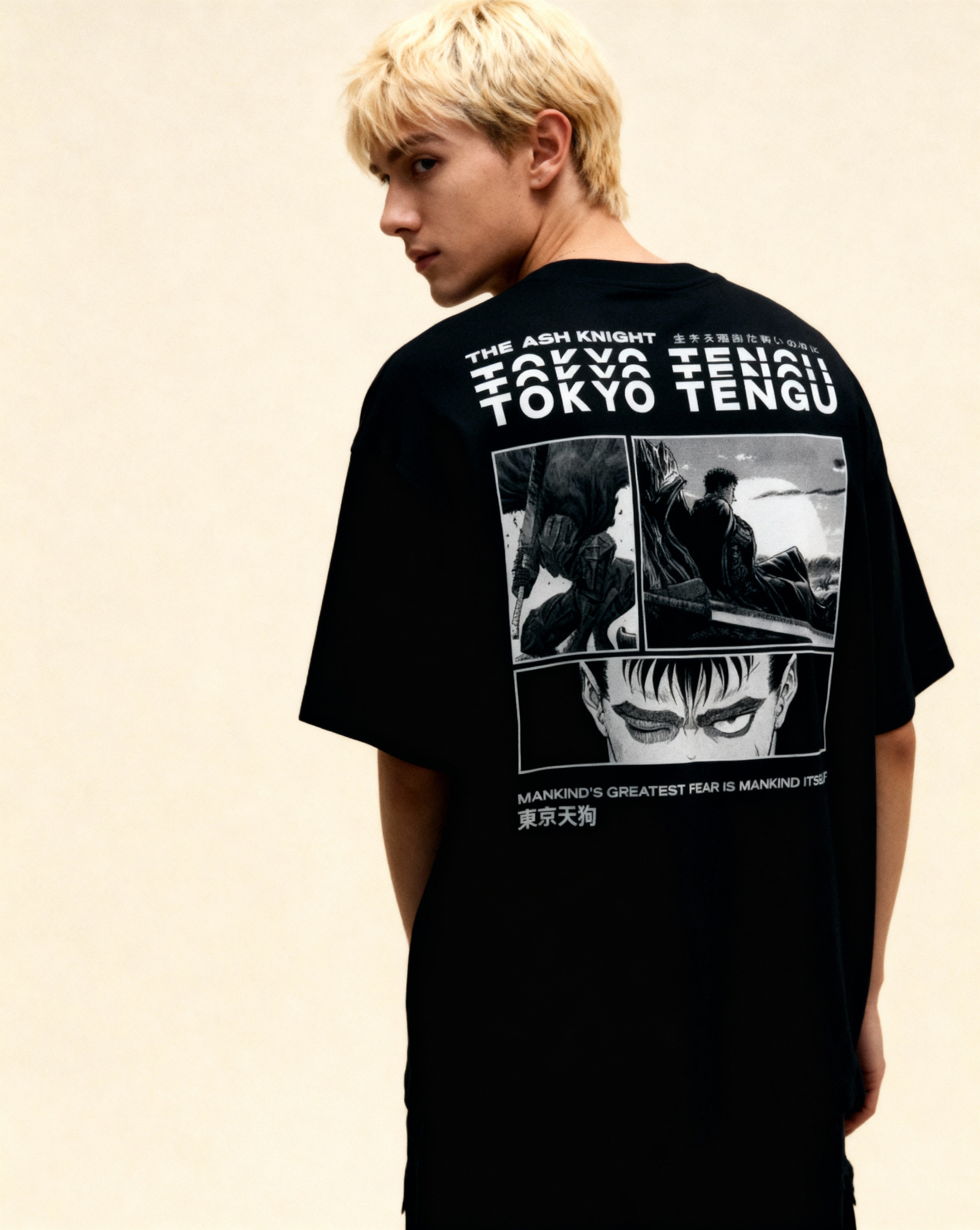 Blond_man_wearing_Black_Eclipse_-_Black_back_pose_looking_at_us_dark_and_moody