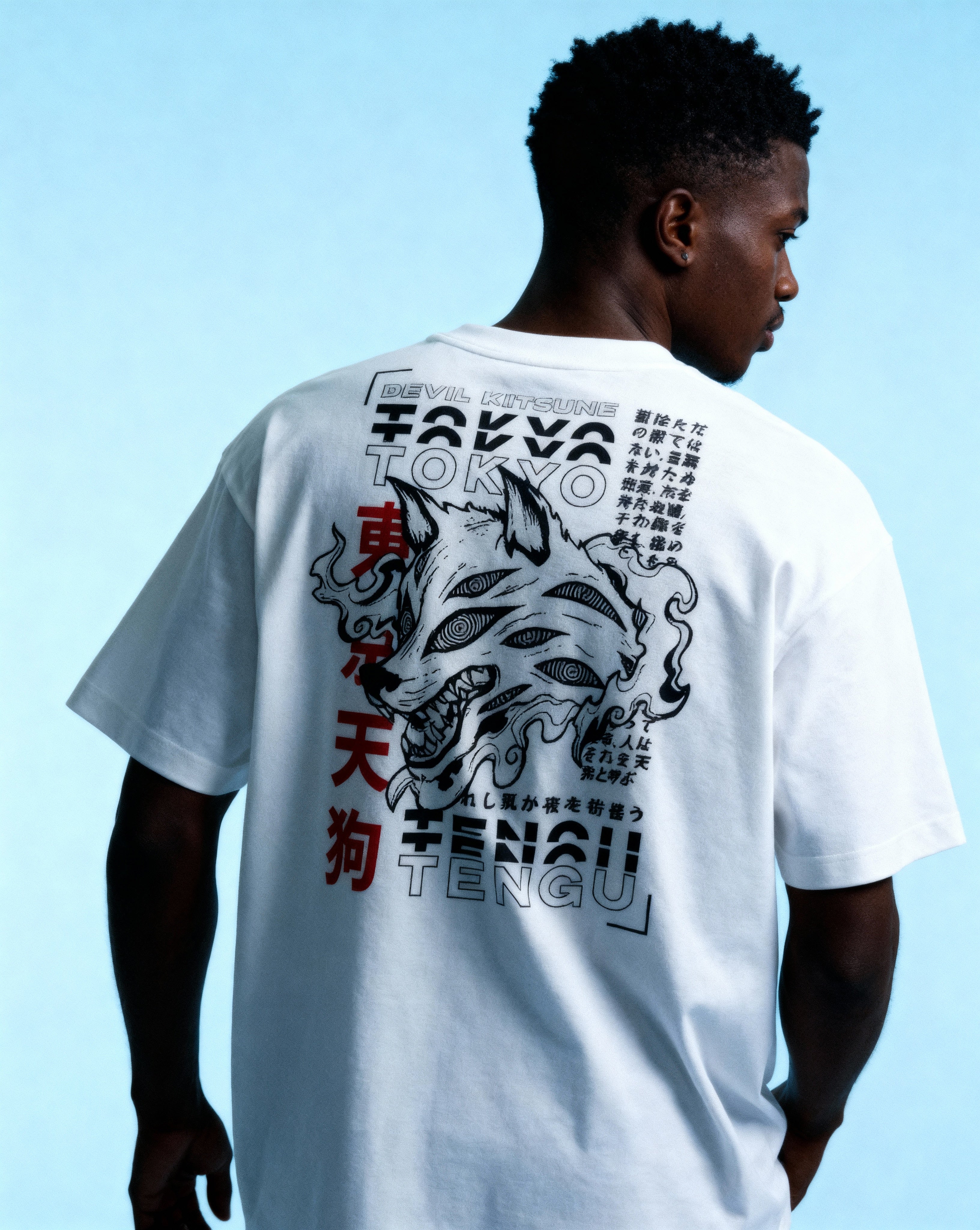 Namibian_man_wearing_Devil_Pact_-_White_back_pose_looking_at_us_dark_and_moody_1