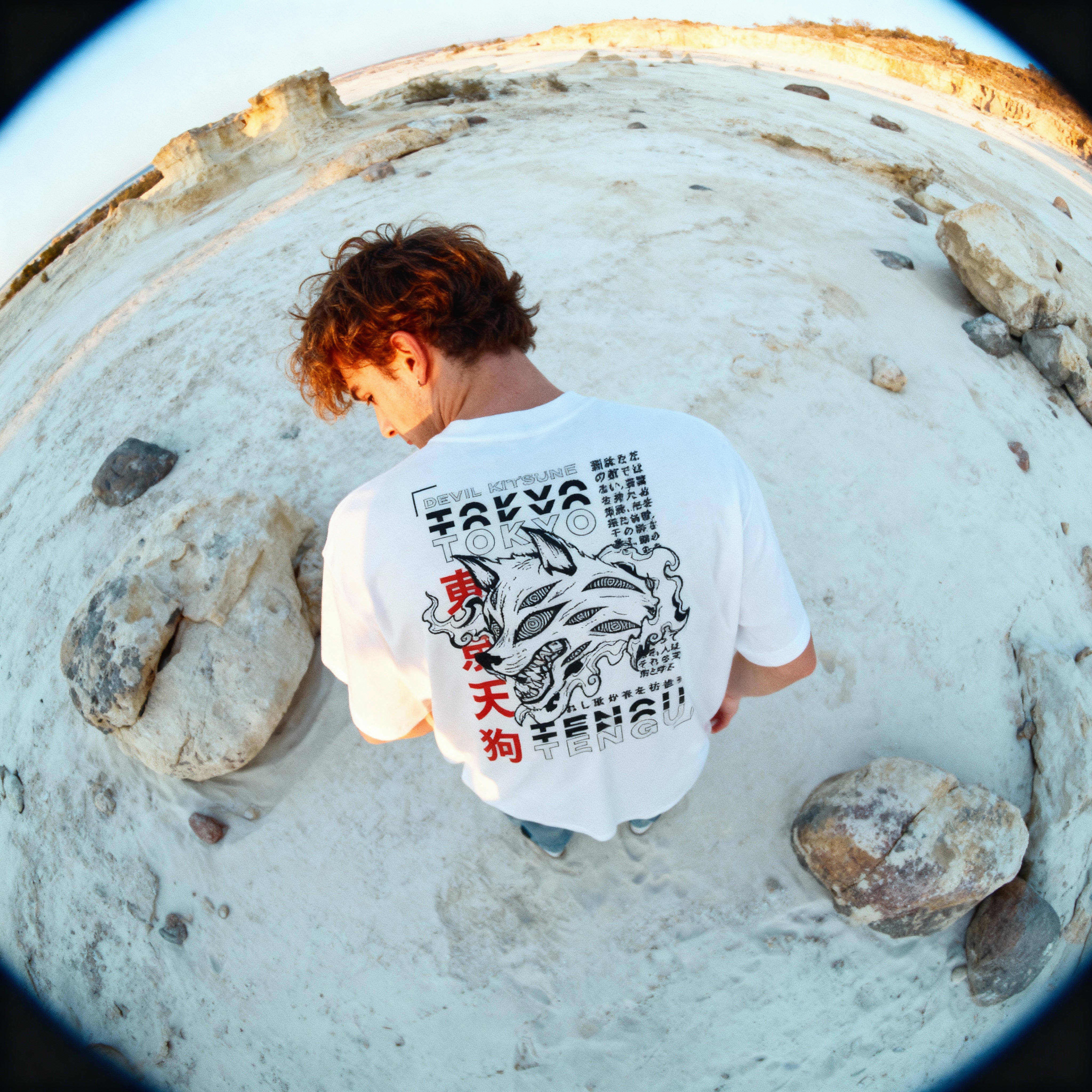 white_man_wearing_Devil_Pact_-_White_back_pose_looking_down_into_camera_low_angle_shot_with_fish-eye_lens